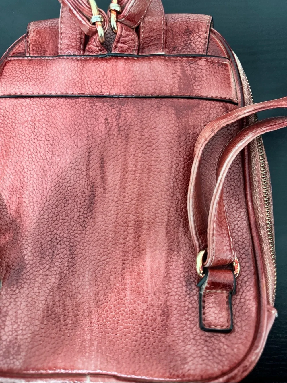 Distressed Circle Backpack With Red Flower lock Accent